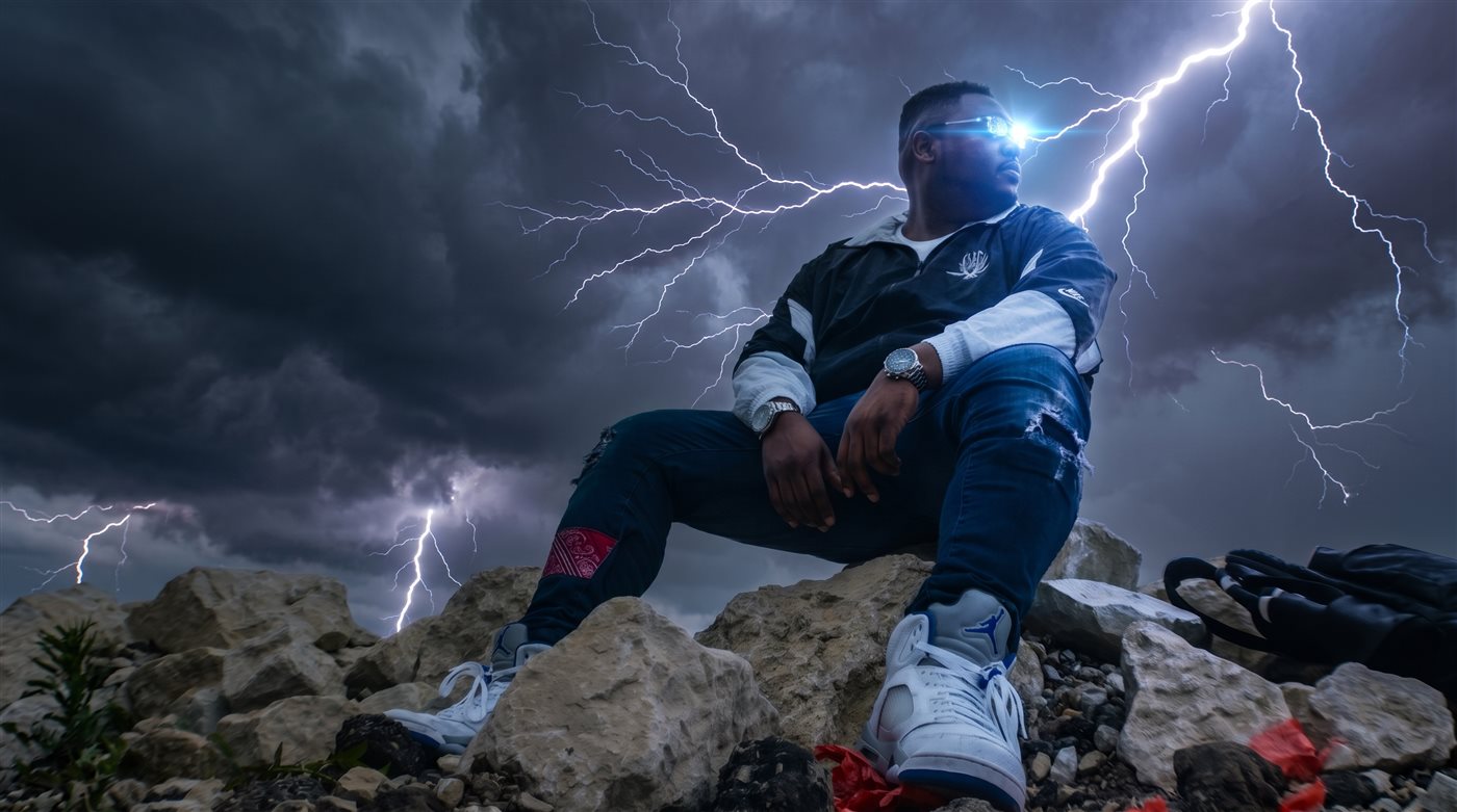 The Ultimate Rage, founder of OD9, elevated at the edge of the city, looking out